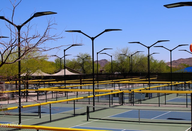 40807 N Barnum Way, Anthem, AZ 85086 - view of tennis court with a mountain view