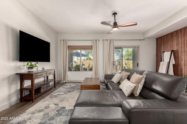 40807 N Barnum Way, Anthem, AZ 85086 - living room with ceiling fan, wood finished floors, and baseboards