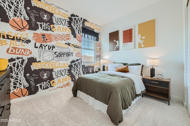 carpeted bedroom featuring baseboards