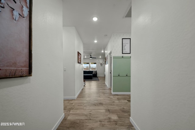 hallway featuring light wood-type flooring