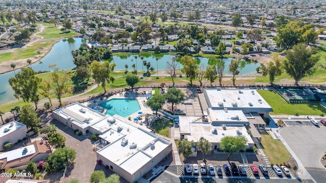 bird's eye view featuring a water view and a residential view