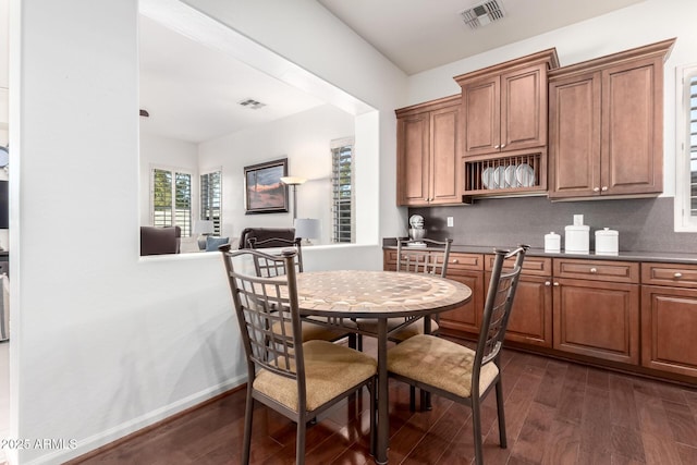 dining room featuring dark hardwood / wood-style floors