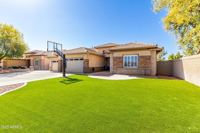 prairie-style home with a garage and a front lawn