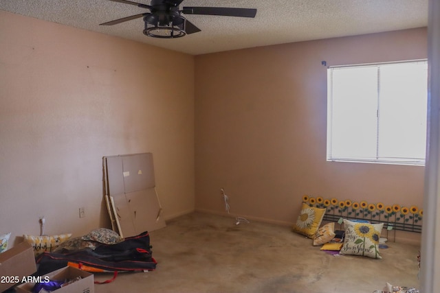 spare room featuring carpet, a textured ceiling, and ceiling fan