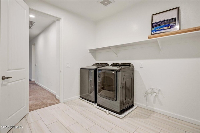 970 W Zion Way, Chandler, AZ 85248 - laundry area with independent washer and dryer, baseboards, and wood tiled floors