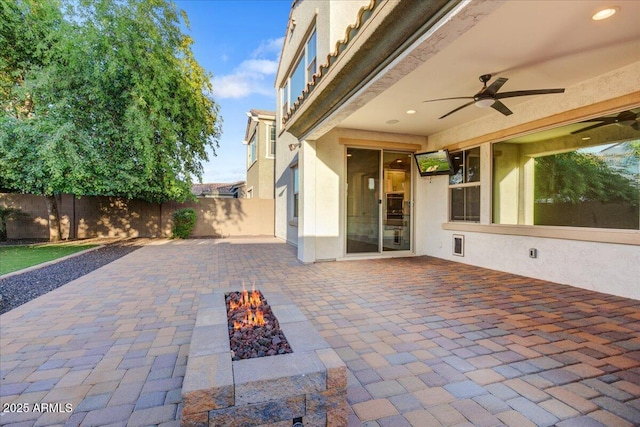 970 W Zion Way, Chandler, AZ 85248 - view of patio / terrace featuring a fire pit, ceiling fan, and a fenced backyard