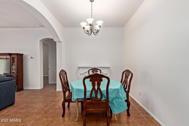 3553 W Dancer Ln, San Tan Valley, AZ 85144 - dining space with a chandelier and arched walkways