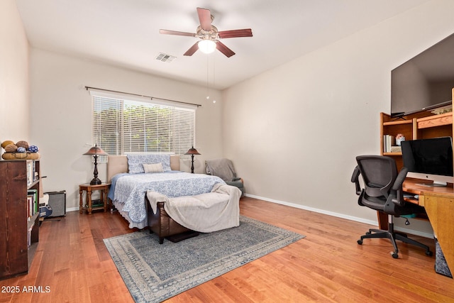 3553 W Dancer Ln, San Tan Valley, AZ 85144 - bedroom with a desk, wood finished floors, and a ceiling fan