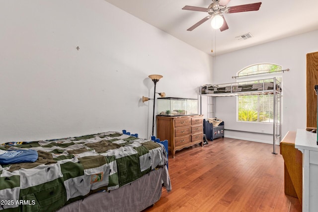 3553 W Dancer Ln, San Tan Valley, AZ 85144 - bedroom with wood finished floors, a ceiling fan, and vaulted ceiling