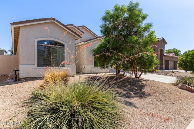 3553 W Dancer Ln, San Tan Valley, AZ 85144 - view of front facade with stucco siding and a tiled roof