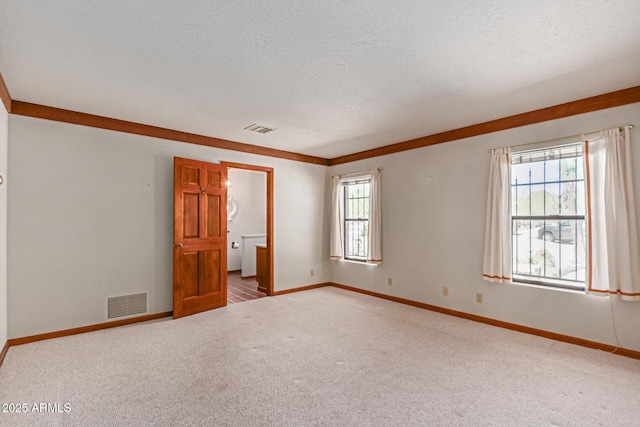 1305 Coyote Pass, Carefree, AZ 85377 - empty room with a wealth of natural light, carpet, and visible vents