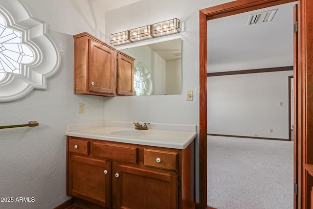 1305 Coyote Pass, Carefree, AZ 85377 - bathroom featuring visible vents, baseboards, and vanity