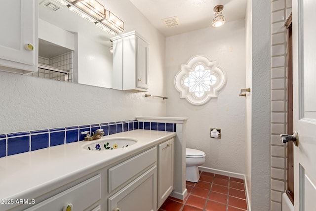 1305 Coyote Pass, Carefree, AZ 85377 - full bath with visible vents, toilet, vanity, and tile patterned floors