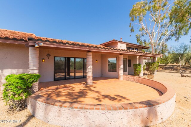 1305 Coyote Pass, Carefree, AZ 85377 - rear view of property with a patio, stucco siding, and a tile roof