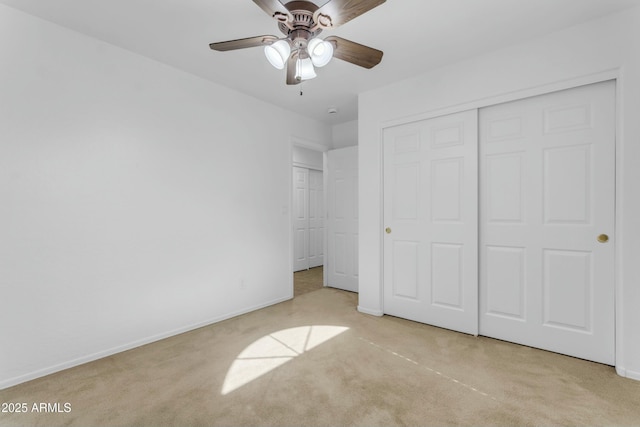 unfurnished bedroom featuring a closet and ceiling fan