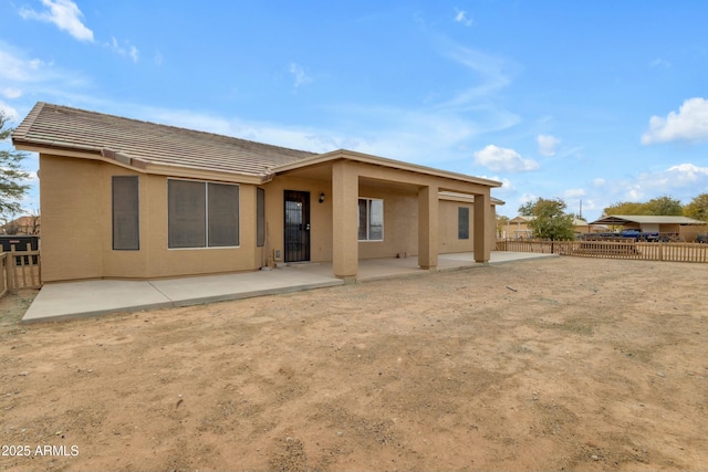 back of house featuring a patio