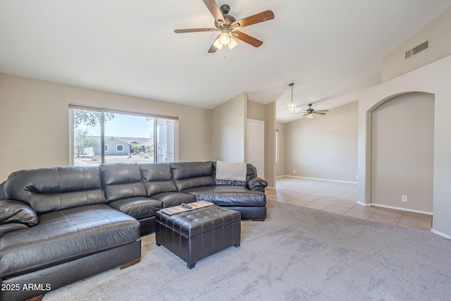 5944 W Greenbriar Dr, Glendale, AZ 85308 - tiled living area with lofted ceiling, a ceiling fan, visible vents, and carpet