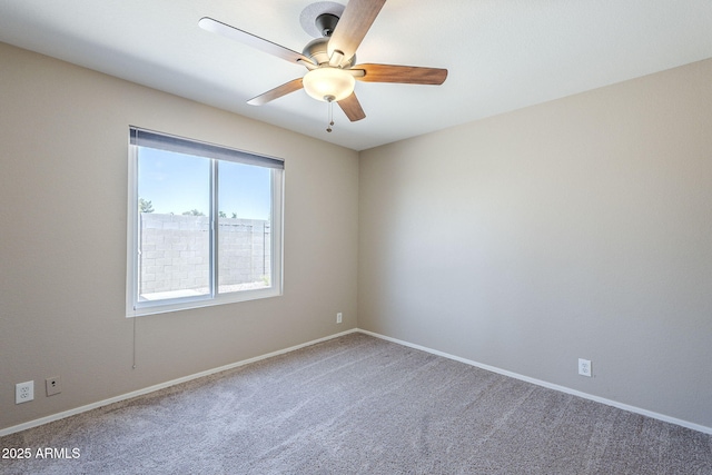 5944 W Greenbriar Dr, Glendale, AZ 85308 - carpeted spare room with baseboards and ceiling fan
