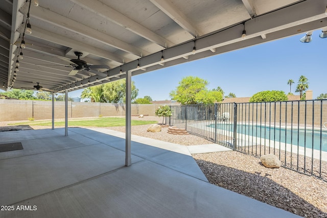 5944 W Greenbriar Dr, Glendale, AZ 85308 - view of patio / terrace featuring ceiling fan, a fenced backyard, and a fenced in pool