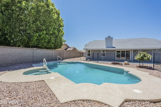 5944 W Greenbriar Dr, Glendale, AZ 85308 - view of pool with a fenced backyard, a pool with connected hot tub, and a patio