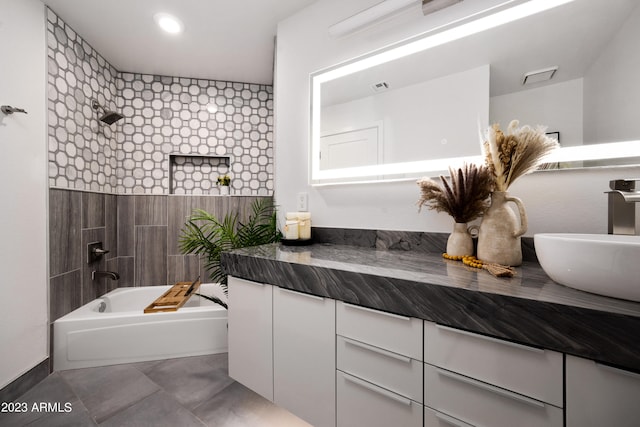 bathroom with vanity and tile flooring