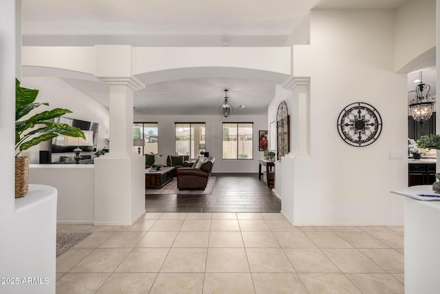 21842 E Via De Olivos, Queen Creek, AZ 85142 - entrance foyer featuring decorative columns, light tile patterned floors, baseboards, and arched walkways