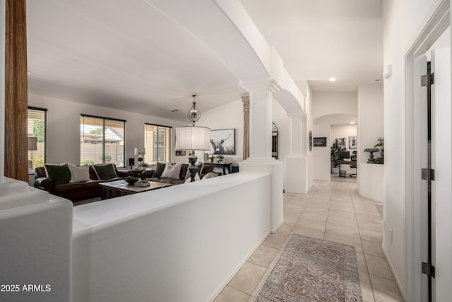 21842 E Via De Olivos, Queen Creek, AZ 85142 - corridor featuring arched walkways, decorative columns, and light tile patterned flooring