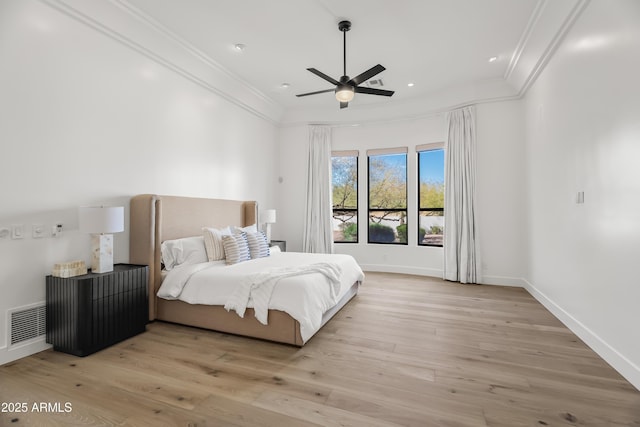 bedroom featuring visible vents, baseboards, recessed lighting, crown molding, and light wood-type flooring