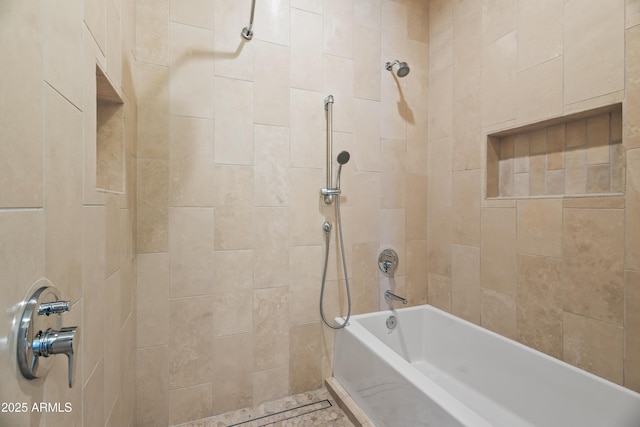 full bath with a bathing tub and a tile shower