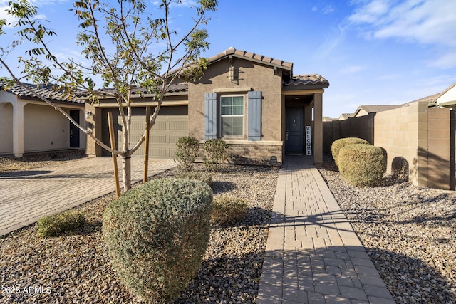 view of front of home featuring a garage