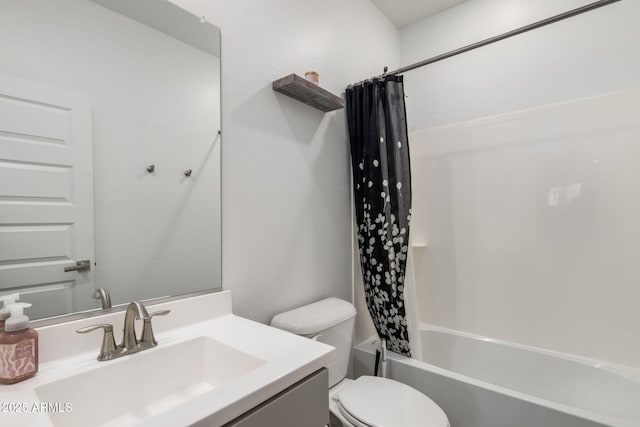 full bathroom featuring shower / bathtub combination with curtain, vanity, and toilet