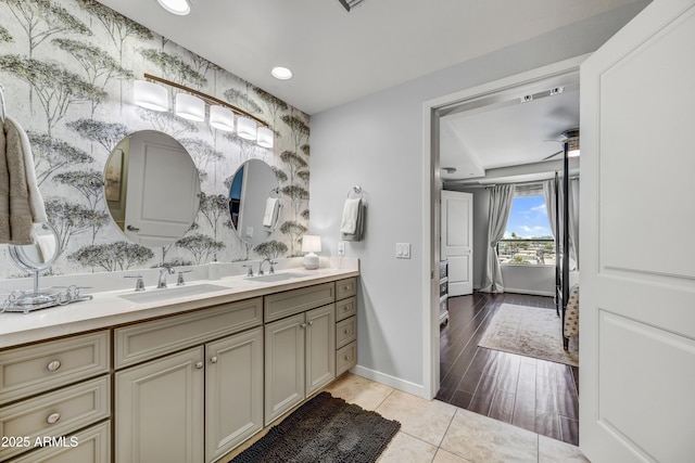 6803 E Main St Unit 5506, Scottsdale, AZ 85251 - full bathroom with double vanity, an accent wall, recessed lighting, and tile patterned floors