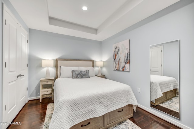 6803 E Main St Unit 5506, Scottsdale, AZ 85251 - bedroom with a raised ceiling, dark wood-type flooring, and recessed lighting