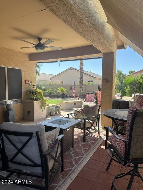 view of patio / terrace featuring ceiling fan and an outdoor hangout area