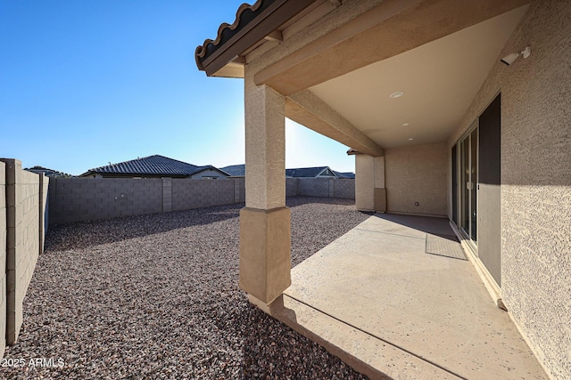 view of yard with a patio and a fenced backyard