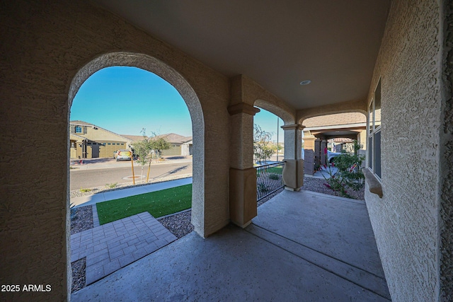 view of patio with a residential view