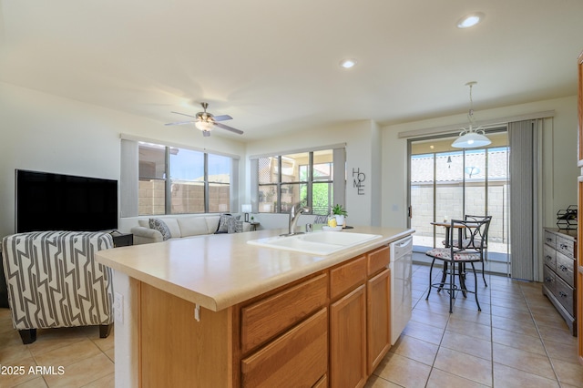 17640 W Babbitt Dr, Surprise, AZ 85374 - kitchen featuring light tile patterned floors, a ceiling fan, a sink, and white dishwasher