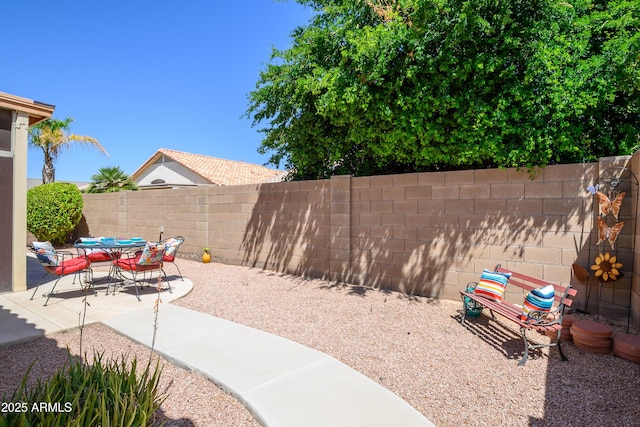 17640 W Babbitt Dr, Surprise, AZ 85374 - exterior space featuring outdoor dining area and a fenced backyard