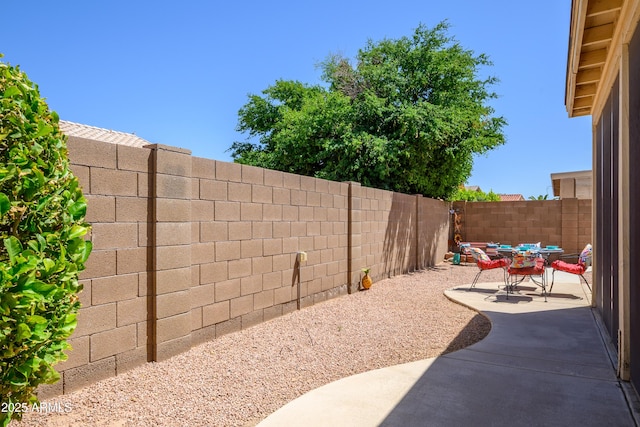 17640 W Babbitt Dr, Surprise, AZ 85374 - view of patio with a fenced backyard and outdoor dining area