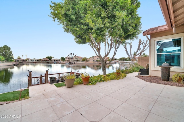 view of patio / terrace featuring a water view