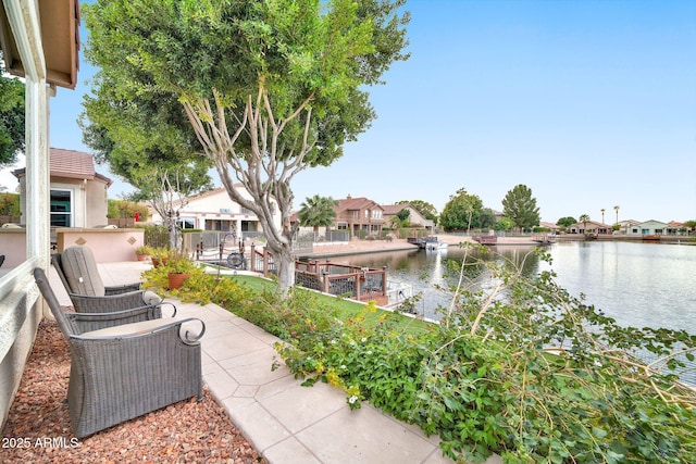 view of patio / terrace with a water view