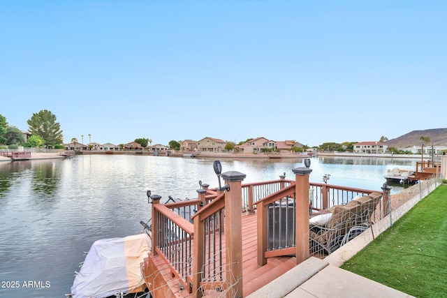 dock area with a water view