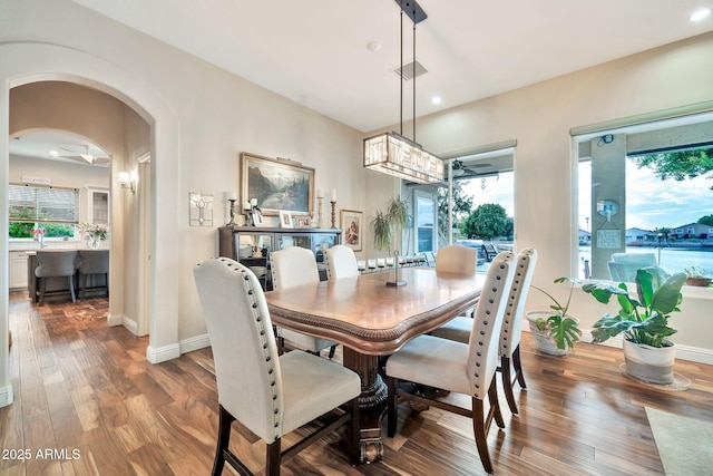 dining room featuring a notable chandelier and hardwood / wood-style flooring