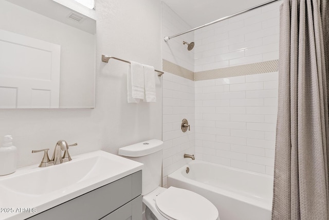 full bathroom featuring shower / bathtub combination with curtain, vanity, and toilet