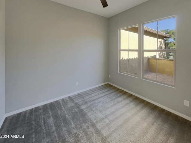 unfurnished room with carpet and ceiling fan