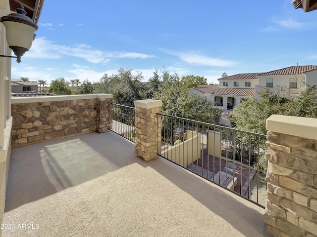 view of patio with a balcony