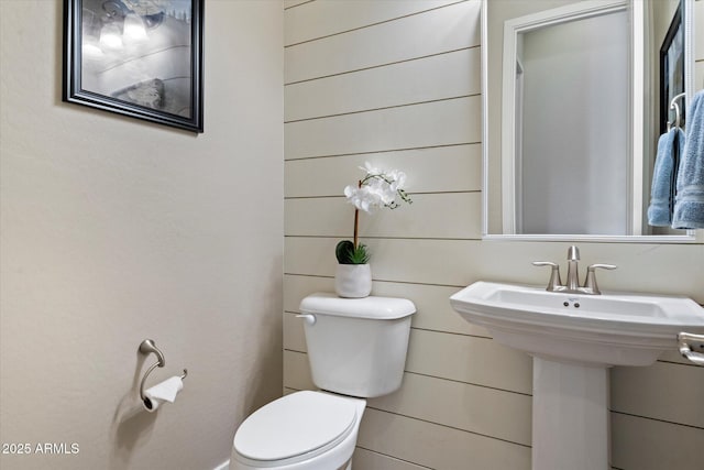 bathroom featuring toilet