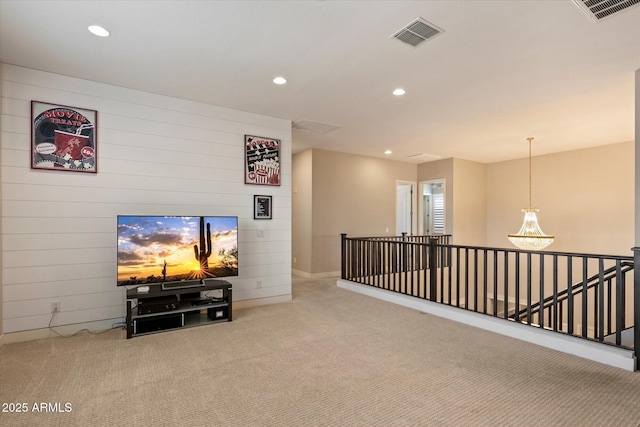 interior space featuring recessed lighting, visible vents, and carpet floors