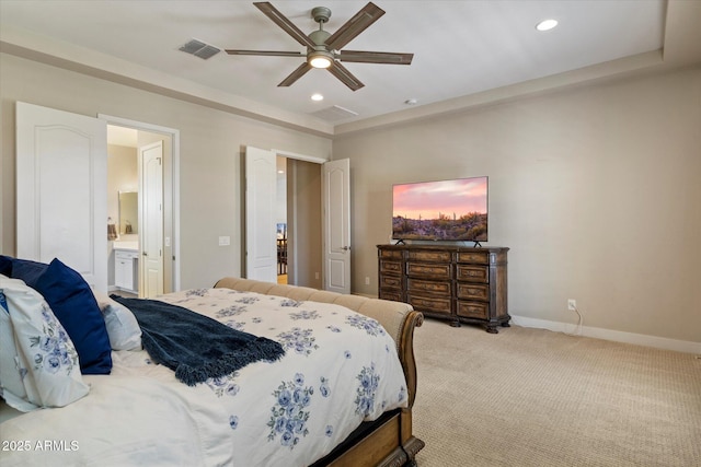 bedroom featuring ensuite bathroom, visible vents, recessed lighting, light carpet, and baseboards