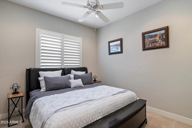 bedroom with baseboards, carpet flooring, and ceiling fan